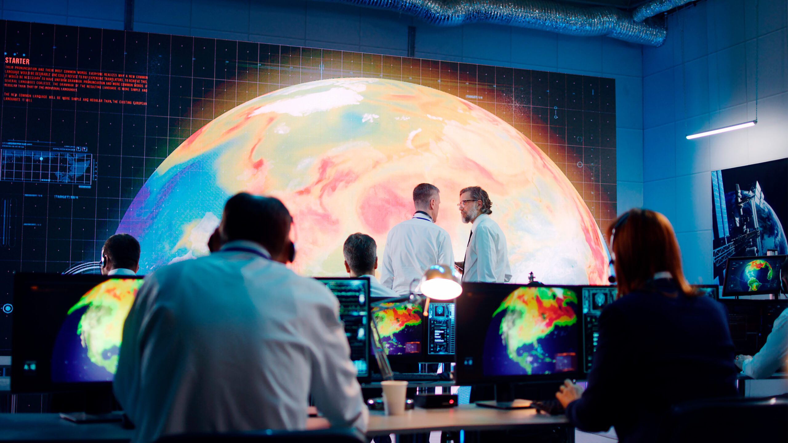 people discussing hot air movements on Earth while team of employees using computers