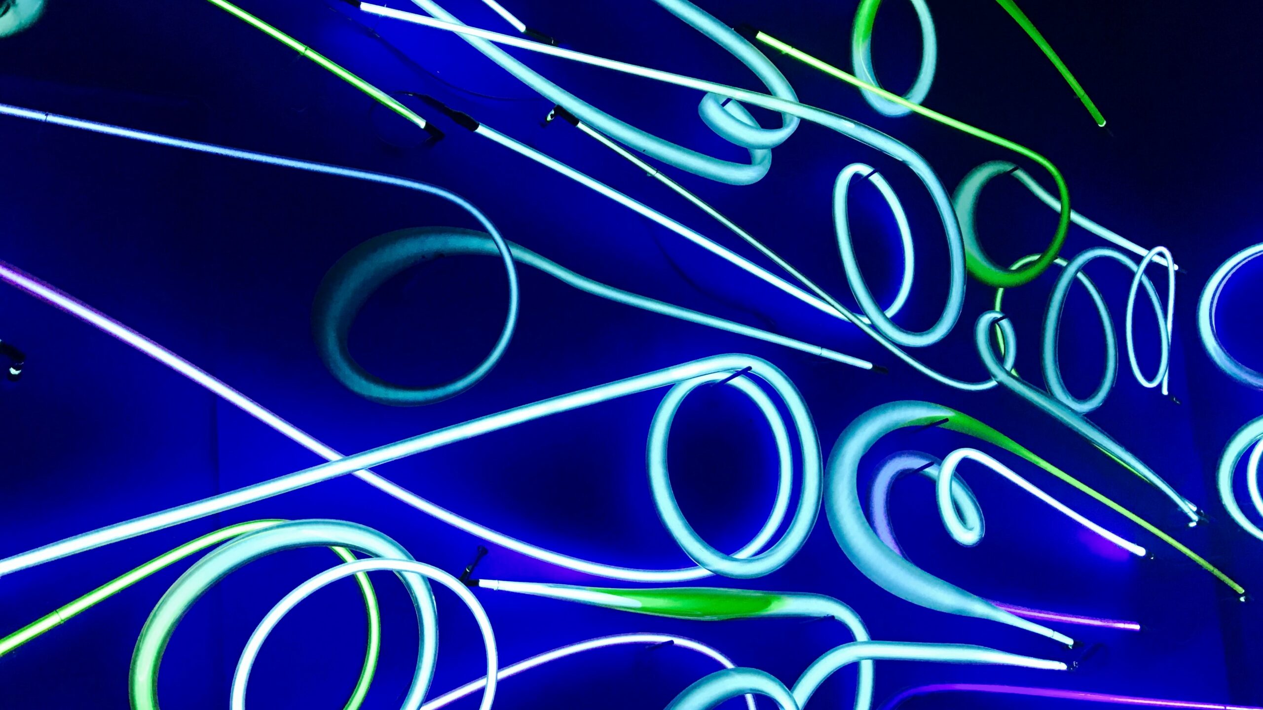 Abstract neon lights in swirling shapes