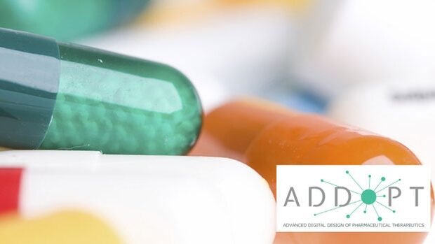 A close up of multicoloured pill capsules with the ADDOPT logo in the corner.