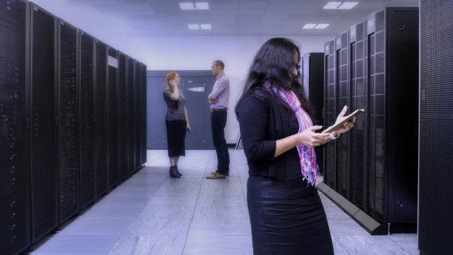 people in the interior of a data centre